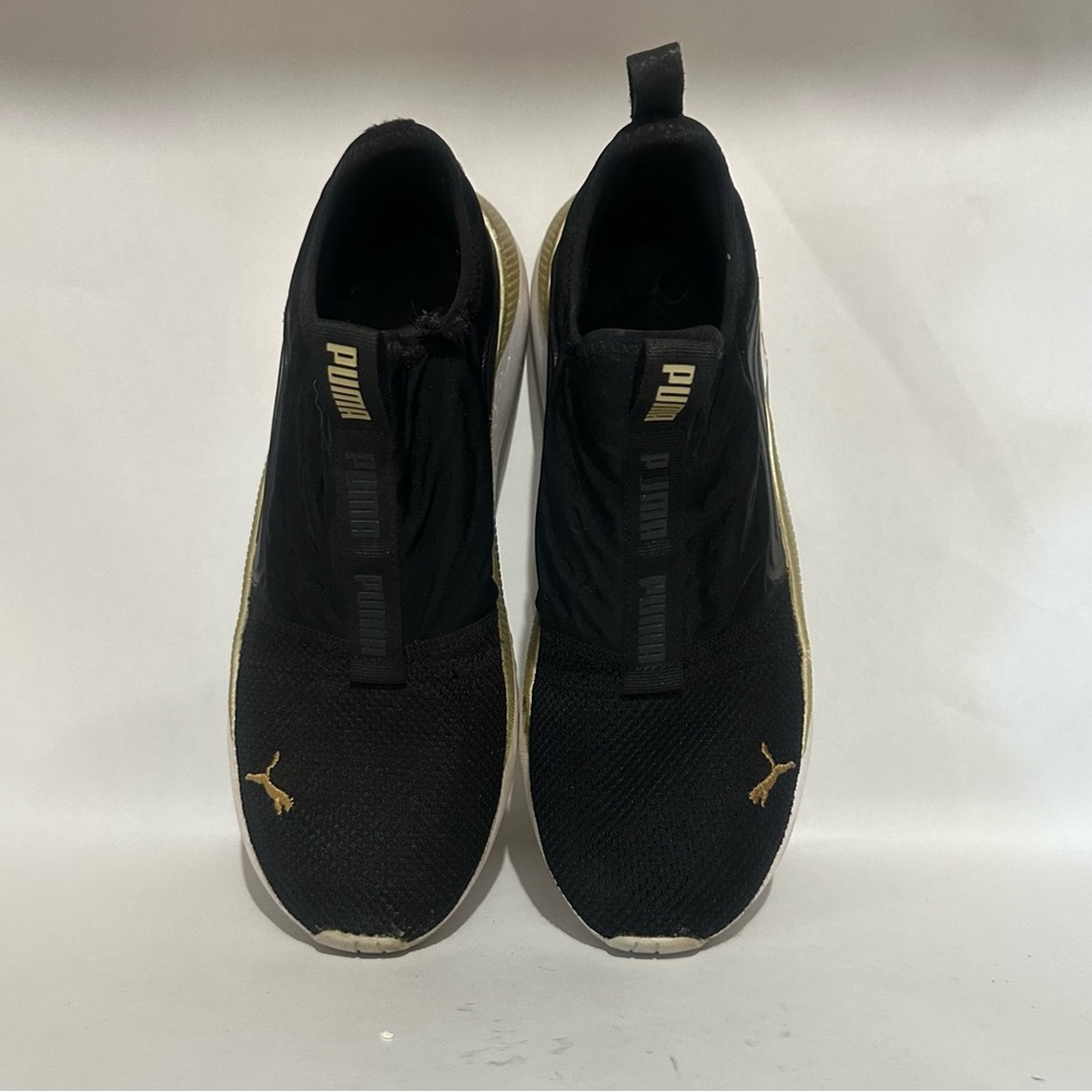 Puma Women’s Black and Gold Athletic Shoes